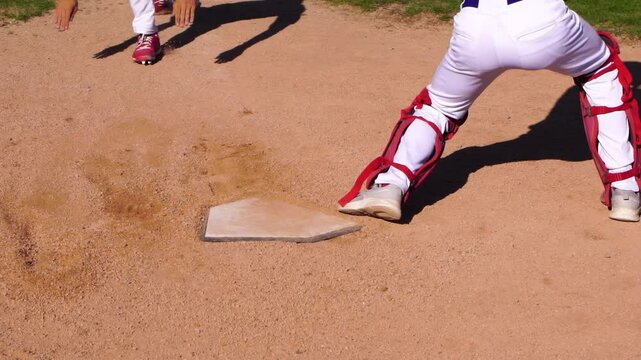 An intricate action sequence showcasing a thrilling baseball slide to home plate during a game