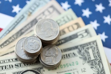American US dollars money bills and on American flag close up