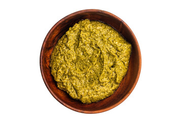 Basil Pesto sauce, Iitalian sauce in a wooden bowl isolated on white background