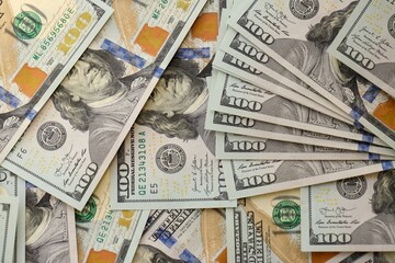 Background with money American hundred dollar bills. 100 dollar bills background close up