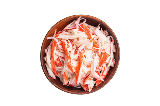Fresh Crab meat, crabmeat in wooden bowl isolated on the white background. top view