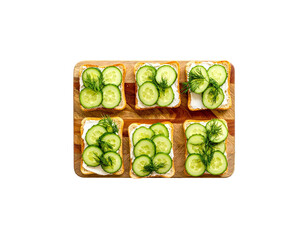 Cucumber Sandwiches with Dill on Wooden Board – Top View

