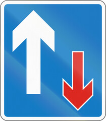 Information road sign in Uganda - Priority over oncoming traffic