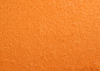 Orange colored felt fabric,  background texture