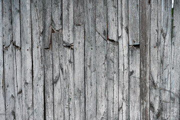 Background of an old faded wooden fence