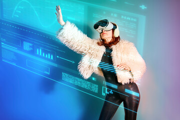 Woman using virtual reality simulator with cyber glasses and neon light