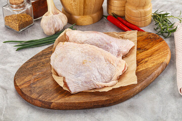 Raw chicken thigh for cooking