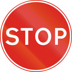 Regulatory road sign in Uganda - Temporary traffic control - STOP