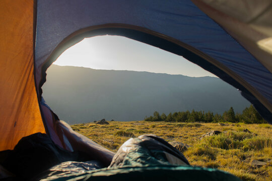 Waking Up in Nature &ndash; View from Inside a Tent at Sunrise in the Mountains