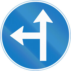 Regulatory road sign in Uganda - Ahead or Turn Left