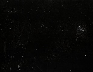 Grungy black surface with numerous white scratches and dust particles, creating a distressed and textured overlay for abstract or vintage designs.