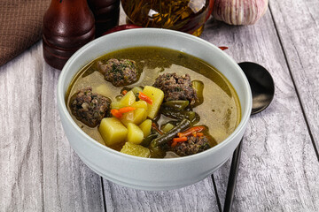 Soup with beef meatballs and vegetables
