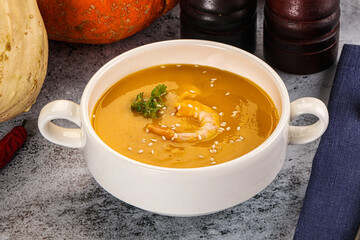 Pumpkin cream soup with prawns