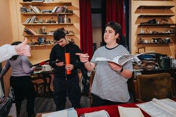 Actors collaborating backstage in a vibrant setting, preparing scripts, tools, and props for an...