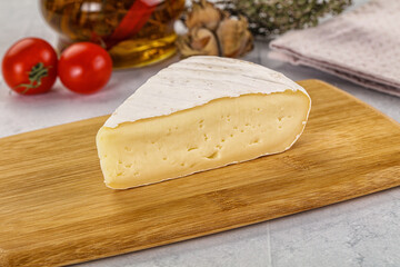 Soft brie cheese with mold