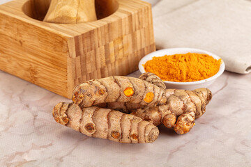 Fresh aroma tumeric roots heap