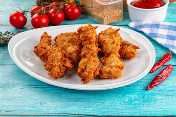 Golden crispy fried chicken strips