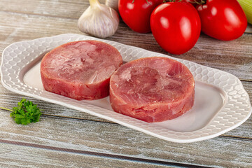 Raw round tuna fish fillet