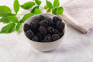 Raw sweet juicy blackberry in the bowl