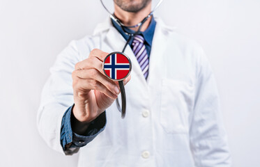 Norway healthcare system, doctor holding stethoscope. Norway health and medical insurance concept