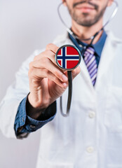 Norway health and medical insurance concept. Norway healthcare system, doctor holding stethoscope