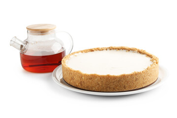 Tasty cheesecake and tea isolated on white