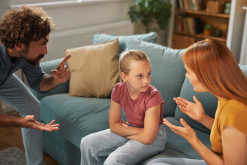 Parents express concern to their daughter in a living room setting, highlighting a discussion about...
