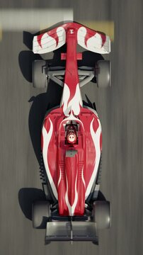 Top view of a generic formula one race car driving across the finish line. 3d animation rendering