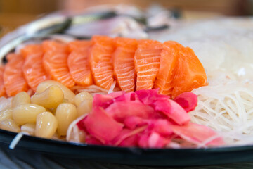 salmon sashimi with rakkyo and gari