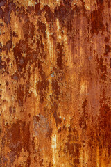 Rusty metal surface with flaking paint outdoors, industrial vibe