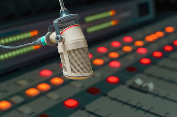 Professional microphone and sound mixer in radio station studio