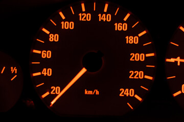 Speedometer of car in the dark. After edits.