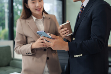 Asian business people working as a good team in the office. Successful teamwork in a meeting,...