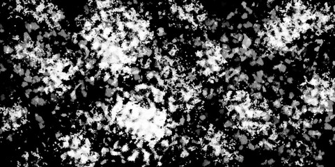 Snowflakes on dark background. white icy snowflakes isolated on black background, natural background. white crystalline powder on a black background. sugar dust. texture, pattern and clipping.