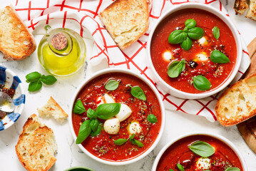 Roasted Tomato Soup with Mozzarella and Basil Caprese Style.selective focus