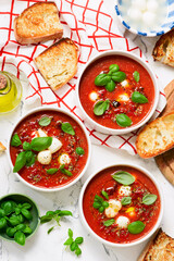 Roasted Tomato Soup with Mozzarella and Basil Caprese Style.selective focus