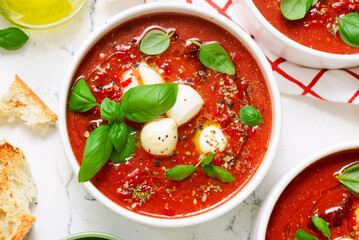 Roasted Tomato Soup with Mozzarella and Basil Caprese Style.selective focus