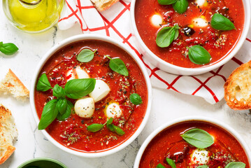 Roasted Tomato Soup with Mozzarella and Basil Caprese Style.selective focus