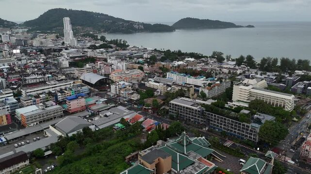 Drone aerial birds eye view patong walking street bangla road phuket town thailand coast city beach