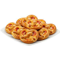 Freshly baked pretzel bites arranged on a white plate, ideal for snacks or parties