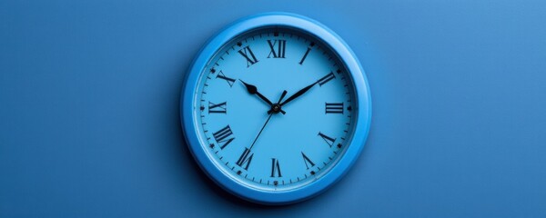 Blue Analog Wall Clock on a Textured Blue Background