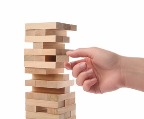 Lviv, Ukraine - December 05, 2023: Woman playing Jenga on white background, closeup