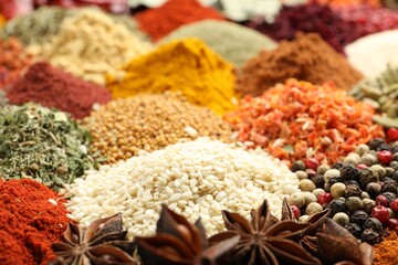Different aromatic spices as background, closeup view