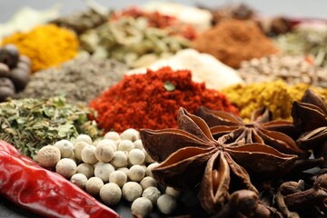 Different aromatic spices as background, closeup view