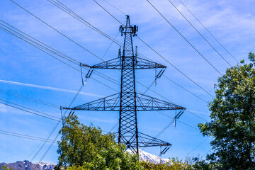 Alpine mountain landscape panorama of Lechtal Austria blue sky Power pole.
