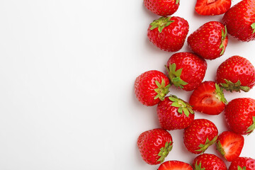 Fresh ripe strawberries on white background, flat lay. Space for text