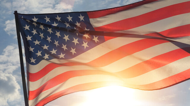 close up American flag waving in the wind against sunset. outdoor background for 4th of July, Memorial Day, Independence Day, Veterans Day, Celebrate USA, American President Election