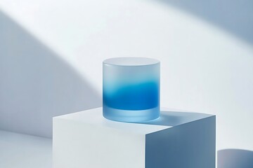 Blue Gradient Glass Jar on White Pedestal