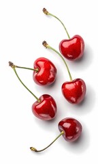 Five ripe red cherries with green stems isolated on white background