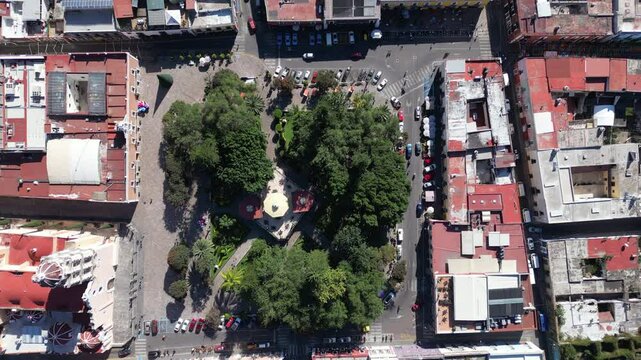 Aerial top down shot of zocalo in Atlixco, Mexico. 